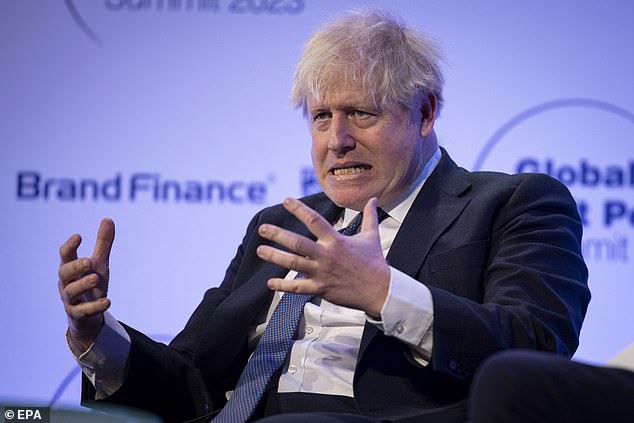 The former prime minister sang a song about the Charlie and the Chocolate Factory character Augustus Gloop to stunned business leaders at a London conference.