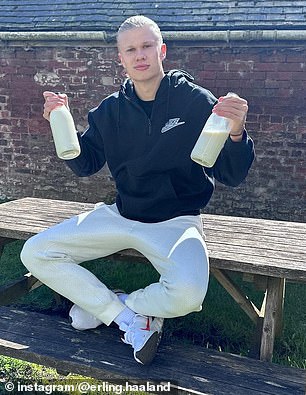 Haaland proudly shows off his two bottles of milk