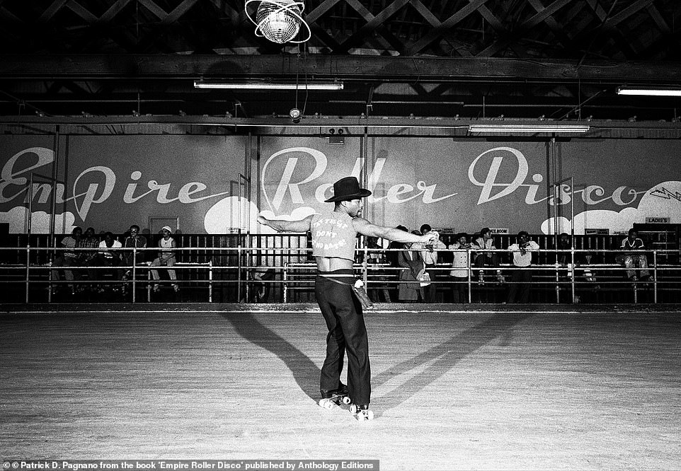 A man decked out in a cowboy costume dances across the boards at the Empire Rollerdrome