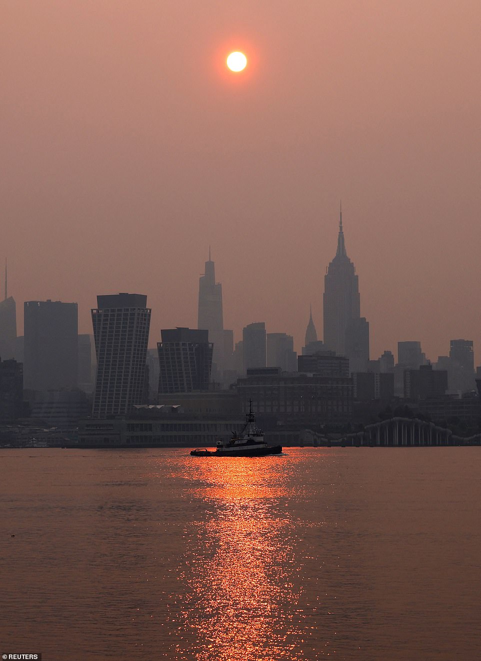 New York City was blanketed by a thick sheet of smoke Tuesday evening due to record wildfires in Canada