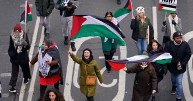 A global day of protests draws thousands in London and other cities in pro-Palestinian marches