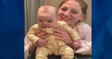 Kristin Sherman wirh her baby