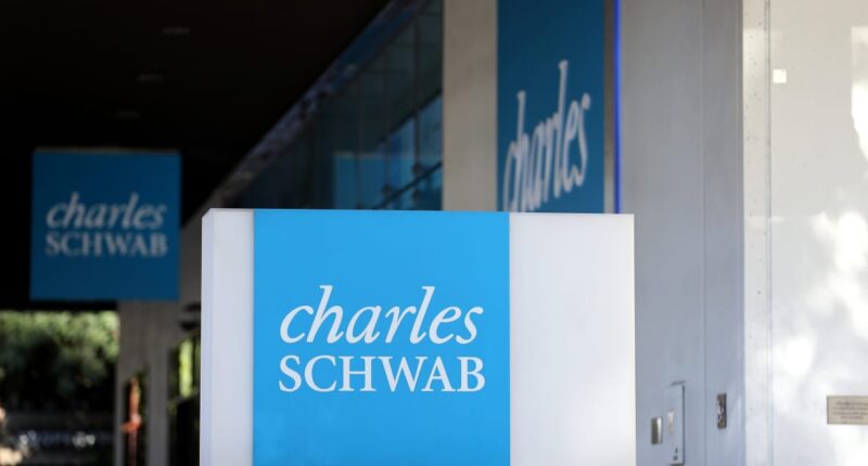 Charles Schwab profit is halved but beats analyst estimates