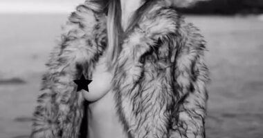 Heidi Klum was seen in a new eye-popping post to Instagram on Thursday. The 50-year-old  was seen in an open fur coat which flashed her bare breast and displayed her black bikini bottoms. The German pinup added a black star to one of her nipples to protect her modesty