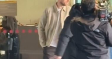 Jordan Henderson as filmed arriving in Amsterdam before being driven away by Ajax general manager Herman Pinkster