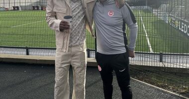 Marcus Rashford, pictured with Gerry Flynn of Larne FC, flew to Belfast by private jet, ostensibly to see Ro-Shaun Williams, a close friend who plays for the Northern Irish club