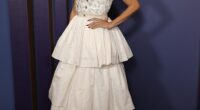The Ferrari star, 49, was every inch the Hollywood leading lady at the event, which was held at the Ray Dolby Ballroom in Los Angeles on Tuesday, wearing a spectacular white tiered gown with an embroidered bodice