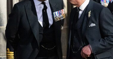 Prince Andrew and King Charles III speak following a vigil in memory of Queen Elizabeth II at St Giles Cathedral in Edinburgh in September 2022