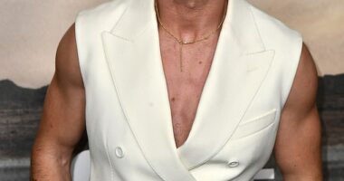 Saltburn star Barry Keoghan flexed his muscles in a unique sleeveless crop top suit for the Masters of the Air premiere on Wednesday