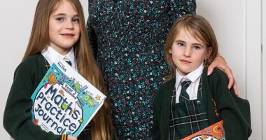 Sara Sutherland and seven-year-old twins Harriett, left, and Charlotte