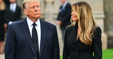 TOPSHOT - Former US President Donald Trump (L) stands with his wife Melania Trump (R) as they depart a funeral for Amalija Knavs, the former first lady's mother, outside the Church of Bethesda-by-the-Sea, in Palm Beach, Florida, on January 18, 2024. Trump's lawyers in a new Supreme Court filing denied he 'engaged in' an 'insurrection'