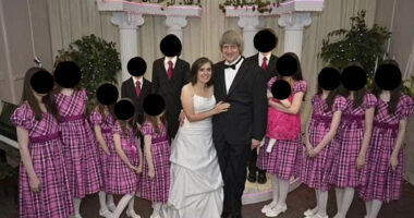 Turpin Family, children in pink dresses standing by parents