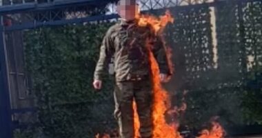 The airman declared he would 'no longer be complicit in genocide' as he set himself alight and livestreamed the horrific scene before being taken to hospital in a critical condition