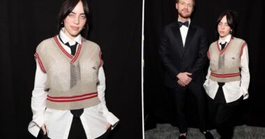 Billie Eilish keeps her schoolgirl streak going in sweater vest on the SAG Awards 2024 red carpet