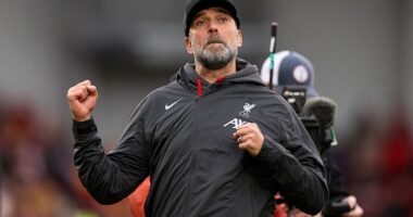 Jurgen Klopp celebrates after Liverpool won 4-1 at Brentford to re-open a five-point lead over Manchester City at the top