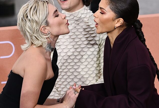 Zendaya looked chic as she arrived at the Dune: Part Two photocall in London on Wednesday with her co-stars Florence Pugh and Timothée Chalamet, where she gave an air kiss to Florence