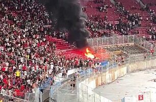 The Chilean Super Cup final was forced to be suspended after fan violence lead to a fire breaking out in the stands
