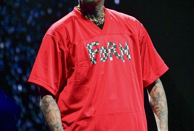 Chris Brown is crying foul after he claimed he was disinvited to play in the NBA All-Star Celebrity Game (Pictured in Atlanta February 13)