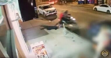 Venezuelan migrant gangsters in New York City drag a 62-year-old woman behind their moped ¿ slamming her into a bike rack (above) before making off with her cell phone.