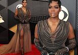 Fantasia Barrino grabs attention with sparkling diamond lip piece and sheer black dress at Grammys 2024 in LA