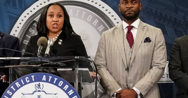 FILE PHOTO: Fulton County District Attorney Fani Willis speaks at a press conference next to prosecutor Nathan Wade after a Grand Jury brought back indictments against former president Donald Trump and his allies in their attempt to overturn the state's 2020 election results, in Atlanta, Georgia, U.S. August 14, 2023. REUTERS/Elijah Nouvelage./File Photo