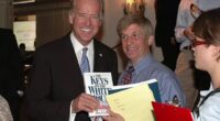 Joe Biden is seen with Allan Lichtman, holding a copy of his book. Lichtman believes the signs show 2024 trending Biden's way