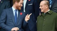 Prince Harry shares a laugh with his grandfather, Prince Philip, at a rugby match in 2015