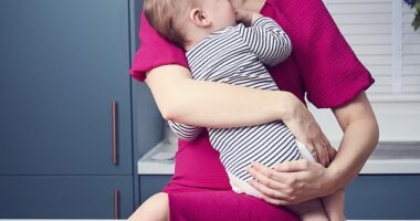 Bryony Farmer - who doesn't experience sexual attraction - with her son Oryn