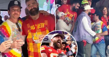 Jason Kelce poses with lifelong Eagles fan Miles Teller as they cheer on Travis at Super Bowl 2024