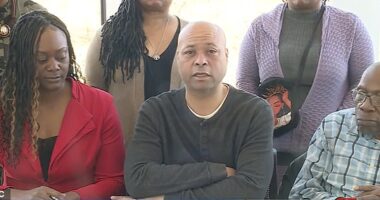 A Kansas City Chiefs fan arrested and photographed in the immediate aftermath of the shooting at the Super Bowl Parade Wednesday has spoken out saying he was detained for being drunk and wasn't part of the groups that led to violence