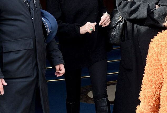 Kate Moss cut a stylish figure as she departed the Ritz Hotel in Paris alongside her daughter Lila on Wednesday