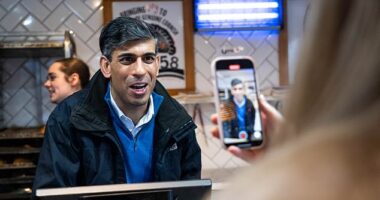 Sir Keir Starmer today demanded Rishi Sunak - pictured on a visit to a bakery in Hayle, Cornwall - 'do the right thing' and apologise 'swiftly' for his transgender joke at PMQs