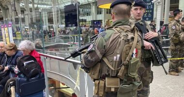 Soldiers patrol inside the Gare de Lyon station after a knife attack at the Gare de Lyon train station in Paris