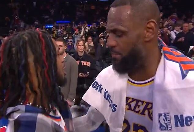 LeBron James (R) shared a moment with (L) Damar Hamlin after the Lakers game on Saturday