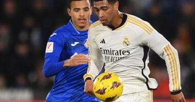 Bellingham (white) allegedly aimed a slur at Mason Greenwood (blue) during the match against Getafe