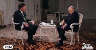 Russian President Vladimir Putin had to use his hand to calm his jittery leg and stop it from moving