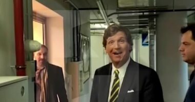 Tucker Carlson shown here in a Moscow parking lot in which he expresses his admiration for the Russian capital