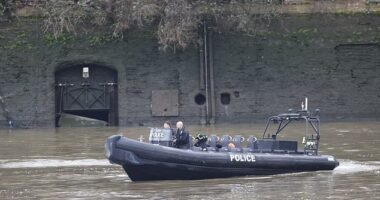 A police boat is seen on the Thames on February 10 as officers search for the body of Ezedi. Police found two other bodies in the river this day as they searched for the Clapham attacker