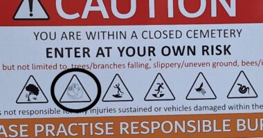 NEA: S'pore cemetery sign warning against ghosts doctored with sticker - Mothership.SG