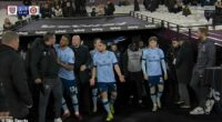 Kevin Nolan (left) is confronted Neal Maupay (centre) as the teams emerged after half-time