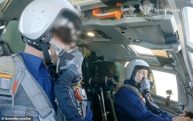 Vladimir Putin taunted the West by taking a joyride in a modernised supersonic Tu-160M strategic nuclear bomber today - as the Kremlin threatened nuclear war