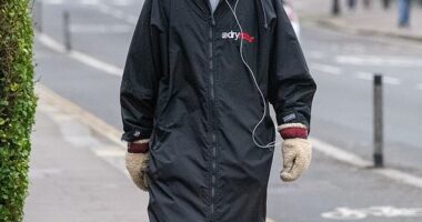 Rarely-seen Take That's Jason Orange, 53, wrapped up in an oversized coat and beanie hat as he enjoyed an afternoon walk in Hampstead on Tuesday