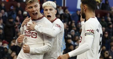 Rasmus Hojlund (left) made it five goals in five games and is hugged by Alejandro Garnacho