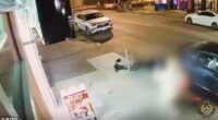 Shocking video shows migrant moped riders dragging woman along NYC street as they steal her phone as cops reveal Venezuelan gang is behind 62 thefts