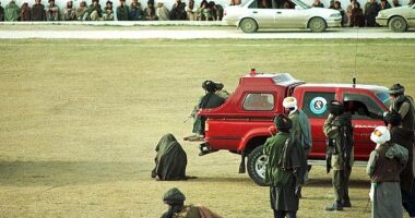 Illustrative image shows an alleged murderer being executed before a crowd in Kabul in 1998