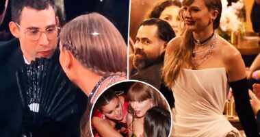 Taylor Swift covers mouth with fan at Grammys 2024 after viral Golden Globes gossip session