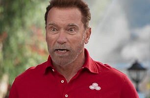 The actor and former California governor was dressed in the State Farm classic ensemble of a red shirt and tan khakis