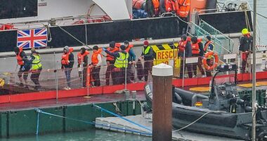 UK security services have some Channel migrants under daily surveillance because they are feared to be a threat, it was claimed today. Pictured, a file image of arrivals being brought ashore. There is no suggestion any of these individuals are involved