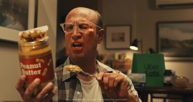 In one scene, a man with a swollen face, eating peanut butter from a jar by the spoon says: 'There's peanuts in peanut butter?' Oh, it's the primary ingredient'