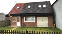 Pictured: the garage before Lexi and Sam purchased the property on the outskirts of Cheltenham for £170,000 in 2016